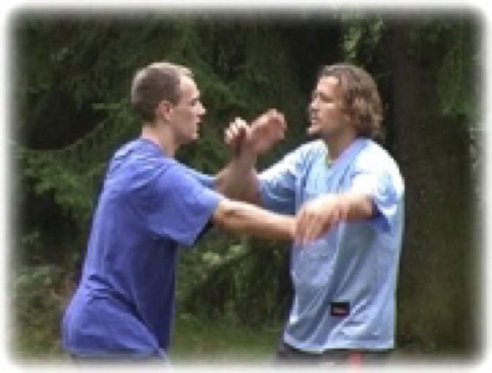 Taikiken Jochem and Mark oushing hands.