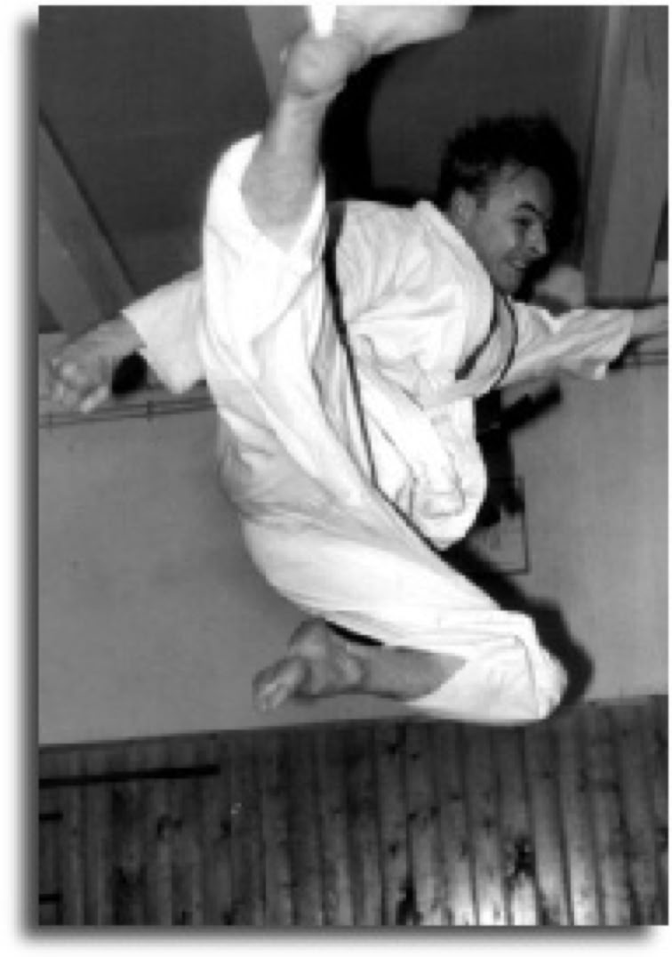 Rinus Schulz showing flying side kick in the Honbu dojo Amsterdam.